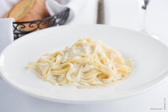 Product: With a white cream sauce. - Swiss Louis in San Francisco, CA Restaurants/Food & Dining