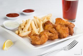 Product: Hand dipped beer battered white fish served with french fries. - Swiss Louis in San Francisco, CA Restaurants/Food & Dining
