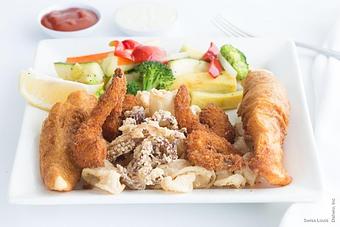 Product: Deep fried calamari, prawns and rock cod. - Swiss Louis in San Francisco, CA Restaurants/Food & Dining