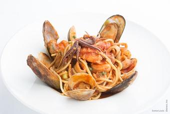 Product: Fresh clams, mussels, calamari and prawns in a light garlic tomato sauce. - Swiss Louis in San Francisco, CA Restaurants/Food & Dining