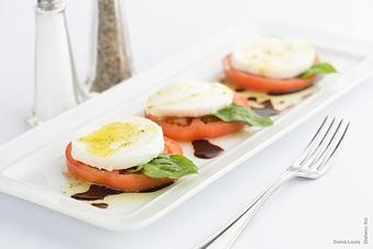 Product: Slices of tomatoes with mozzarella cheese and fresh basil, drizzled with extra virgin olive oil & balsamic vinegar. - Swiss Louis in San Francisco, CA Restaurants/Food & Dining