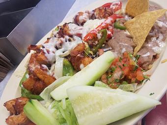 Product: Try one of the cooks specials! Camarones Gordos include: bacon wrapped shrimp wrapped in bacon,our fajita mix,our homemade sauce,rice,beans,cheese and lettuce. - Taqueria Los Gordos in Redding, CA Mexican Restaurants