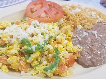 Product: Scrambled eggs that are cooked with tomatoes,onions and jalapenos that are served with rice,beans and tortillas...yes please - Taqueria Los Gordos in Redding, CA Mexican Restaurants