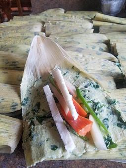 Product: Our vegetarian tamales are stuffed with queso fresco, bell pepper, jalapeño, carrots and potatoes. The masa(corn dough) is mixed with spinach leaves. - Taqueria Los Gordos in Redding, CA Mexican Restaurants