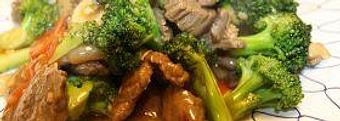Product: Stir-fried sliced beef with scallions, onions, carrots, broccoli, and mushrooms in a savory brown sauce - Teriyaki & Wok in Capitol Hill - Seattle, WA Chinese Restaurants