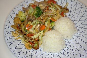 Product: Tender chunks of chicken stir-fried with fresh cut vegetables, cabbage, onions, carrots, mushrooms and broccoli - Teriyaki & Wok in Capitol Hill - Seattle, WA Chinese Restaurants