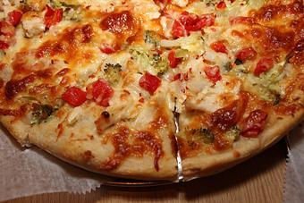 Product: Roasted Garlic, Roasted Red Peppers, Broccoli, Onions, Grilled Chicken and Cheese. Topped with Crushed Red Pepper - The 78 Pub @ This Guy's Pizza in Johnston, RI Pizza Restaurant