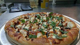 Product: Fresh mushrooms and onions, grilled chicken, cheese, feta, fresh basil and drizzled with a balsamic glaze - The 78 Pub @ This Guy's Pizza in Johnston, RI Pizza Restaurant