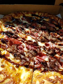 Product: Named after our youngest son, this pizza starts with Roasted Garlic, Cheese, Shaved Steak, Ham and Crispy Bacon. We finish it off with a drizzle of Balsamic Glaze! YUP!...it's THAT good! - The 78 Pub @ This Guy's Pizza in Johnston, RI Pizza Restaurant