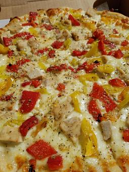 Product: This is named after our oldest son and starts with Roasted Garlic, Cheese, Grilled Chicken, Roasted Red Peppers and Hot Peppers. We then generously sprinkle a cheese, spice and herb blend that we call Magic Dust, over the top! YUP!...it's THAT good! - The 78 Pub @ This Guy's Pizza in Johnston, RI Pizza Restaurant