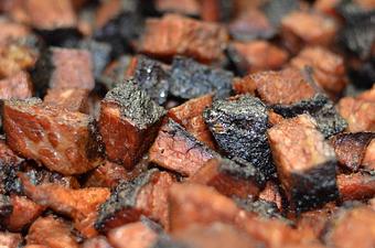 Product: Our Burnt Ends have just the right amount of bark. A few a bit chewy, and a bunch so tender. We leave the sauce off so you can slather your choice. The Pitmaster actually like The BBQ SHACK's Hickory Heat Pepper Sauce on his Burnt Ends. - The BBQ Shack in Paola, KS Barbecue Restaurants