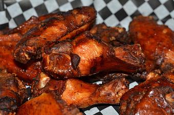 Product: Our Smoked wings are smoked for several hours to get that nice smokey flavor, then deep-fried to obtain a luscious, golden-brown crispy skin. - The BBQ Shack in Paola, KS Barbecue Restaurants