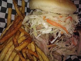 Product: Could be easily construed as the best sandwich on the menu! Our homemade vinegar based cole slaw accentuates the flavor of the pork that is surprisingly delightful! - The BBQ Shack in Paola, KS Barbecue Restaurants