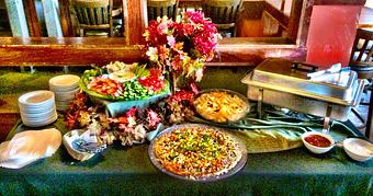 Product: Banquet spread with taco dip, wings, veggie tray - The Brass Ring in Madison, WI Bars & Grills