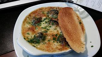 Product: Escargot Du Chef: Chardonnay, Fine Cognac, Chopped Parsley & Garlic Butter - The Brentwood Restaurant & Wine Bistro in Little River, SC European Cuisine