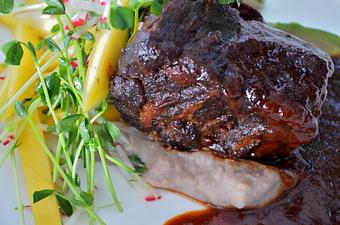 Product: Barbecue Braised Short Ribs,
Drunken Pinto Beans, Avocado, Mango,
Radish, Wild Coriander - The Frog & The Peach in New Brunswick, NJ American Restaurants