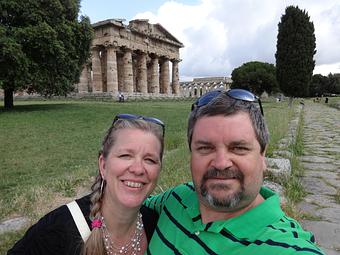 Product: Melissa and Steve on their trip to Italy in front of the Greek Ruins - The Hideaway Grill in Payette, ID American Restaurants