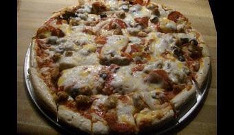 Product: Hand made, locally shopped pizza - The Monarch Public House in Highway 35: The Great River Road - Fountain City, WI American Restaurants
