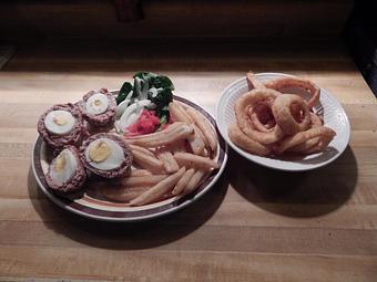 Product: Traditional Eggs-In-The-Pocket and a side of Onion Rings - The Monarch Public House in Highway 35: The Great River Road - Fountain City, WI American Restaurants