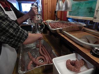 Product: Making our family recipe Bangers in-house - The Monarch Public House in Highway 35: The Great River Road - Fountain City, WI American Restaurants