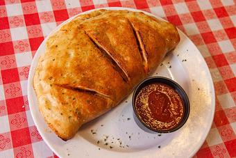 Product - The Original Italian Pie in Downtown CBD - New Orleans, LA Italian Restaurants