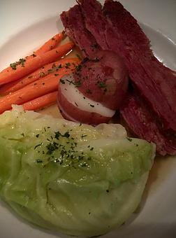 Product: Tender, juicy, flavorful corned beef slow cooked for 11 hours and served with red potatoes, cabbage, & carrots - The Original Patsy's Irish Pub, Laguna Niguel in Laguna Niguel, CA Bars & Grills