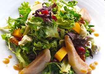 Product: salt roasted bosc pears, fuyu persimmons, sun dried cranberries, pomegranate seeds, toasted walnuts, saga bleu cheese, pomegranate-balsamic vinaigrette - The Plaza Café in Southampton Village - Southampton, NY American Restaurants