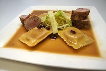 Product: Pork Tenderloin over Butternut Squash Ravioli - The Pointe Restaurant in Provincetown - Provincetown, MA American Restaurants