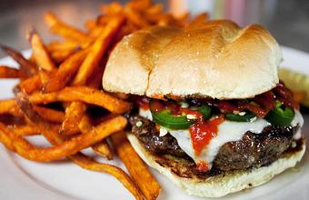 Product: Bon Fire - pickled & sautéed jalapeño peppers | pepperjack cheese | sriracha - The Rail - North Olmsted in North Olmsted, OH American Restaurants