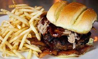 Product: Crouching Burger - Ohio thick-cut bacon | Ohio pork shoulder | crispy won-ton | rail sauce - The Rail - North Olmsted in North Olmsted, OH American Restaurants