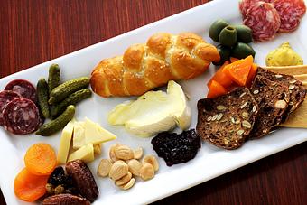 Product: Chef Bev Lazo's impressive variety of premium cheeses and charcuterie, available exclusively at The Rusty Monk. Take the cheese platter to the next level, and try them with a flight of beers paired by Certified Cicerone® Colleen Koestner. - The Rusty Monk in The Historic Uptown Area of Whittier - Whittier, CA Pubs