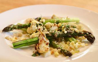 Product: Seasonally inspired menu with daily specials. Pictured: Roasted Local Asparagus & Cauliflower. - The Waterboy in Sacramento, CA American Restaurants