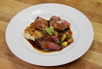 Product: Seasonally inspired menu with daily specials. Pictured: Mixed Grill with Emigh Ranch Lamb Loin, Housemade Garlic Sausage, Ratatouille Provencale & Grilled Polenta. - The Waterboy in Sacramento, CA American Restaurants