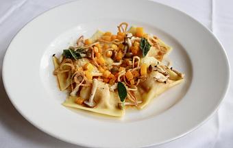 Product: Seasonally inspired menu with daily specials. Pictured: Full Belly Farms Butternut Squash Ravioli with Dragon Mushrooms, Crispy Shallots, Brown Butter, Sage & Reggiano - The Waterboy in Sacramento, CA American Restaurants