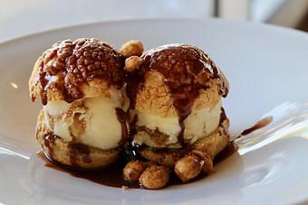 Product: Seasonally inspired menu with daily specials. Pictured: Profiteroles with Peanut Butter Ice Cream, Fudge Sauce - The Waterboy in Sacramento, CA American Restaurants