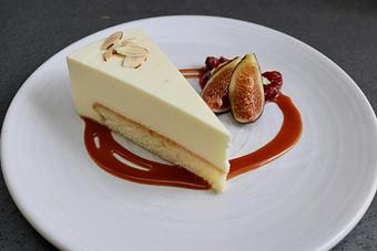 Product: Seasonally inspired menu with daily specials. Pictured: Almond Bavarian Torte with Salted Caramel, Black Mission Figs - The Waterboy in Sacramento, CA American Restaurants