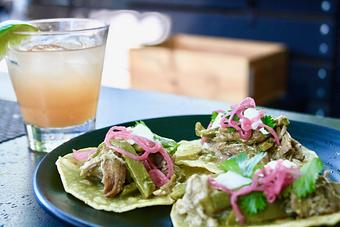 Product: Seasonally inspired menu with daily specials. Pictured: Patio Plates Happy Hour Street Tacos & Cocktail - The Waterboy in Sacramento, CA American Restaurants