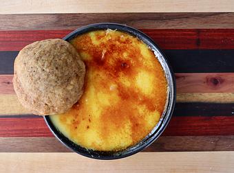 Product: Seasonally inspired menu with daily specials. Pictured: Citrus Crème Brulee with Persimmon Cookie - The Waterboy in Sacramento, CA American Restaurants