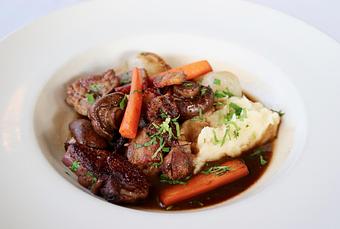 Product: Seasonally inspired menu with daily specials. Pictured: Coq au Vin with Mary's Chicken, Mushrooms, Bacon, Pearl Onions, Carrots, Celery Root-Potato Puree, Red Wine-Shallot Jus - The Waterboy in Sacramento, CA American Restaurants