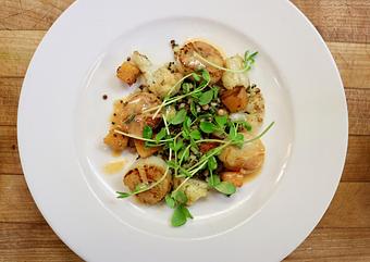 Product: Seasonally inspired menu with daily specials. Pictured: Pan Seared Sea Scallops with Roasted Cauliflower & Winter Squash, Quinoa & Fregola Salad, Heidi's Little Greens & Tomato-Rosemary Butter Sauce - The Waterboy in Sacramento, CA American Restaurants