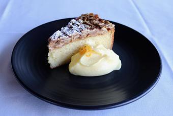 Product: Seasonally inspired menu with daily specials. Pictured: Almond Gateau with Meyer Lemon Cream, Candied Almonds - The Waterboy in Sacramento, CA American Restaurants