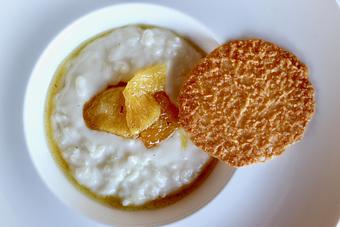 Product: Seasonally inspired menu with daily specials. Pictured: Coconut Rice Pudding with Roasted Pineapple, Coconut Lace Cookies - The Waterboy in Sacramento, CA American Restaurants