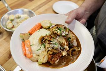 Product: Seasonally inspired menu with daily specials. Pictured: Pan Roasted Chicken Marsala with Creamy Polenta, Mushrooms, Glazed Turnips & Carrots - The Waterboy in Sacramento, CA American Restaurants