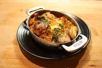 Product: Seasonally inspired menu with daily specials. Pictured: Cassoulet with Smoked Pork Belly, Lamb Shank, Garlic Sausage, Duck Confit, White Beans, Winter Vegetables, Breadcrumbs & Aioli - The Waterboy in Sacramento, CA American Restaurants