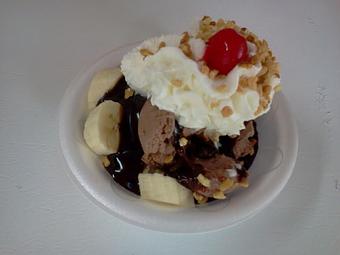 Product: WE LOVE OUR LITTLE HENRY!  It is a sliced banana, peanut buttercup ice cream, hot fudge, whipped cream, nuts and a cherry! - The Widow's Walk Ice Creamery & Bicycle Rentals in Clarksville, IN American Restaurants