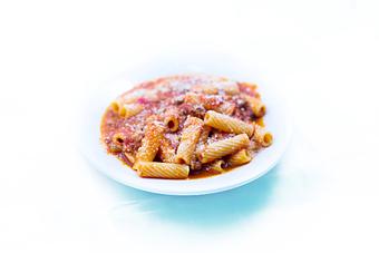 Product: Tube pasta w/our tomato sauce, basil and topped w/fresh mozzarella. - Tiramisu in Quincy, IL Italian Restaurants
