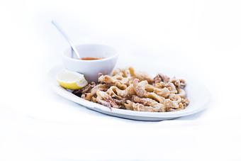 Product: Fried calamari served w/side of our marinara sauce. - Tiramisu in Quincy, IL Italian Restaurants
