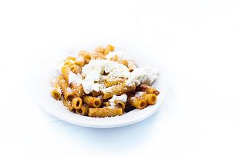 Product: Tube pasta w/our tomato sauce, basil and topped w/fresh mozzarella. - Tiramisu in Quincy, IL Italian Restaurants