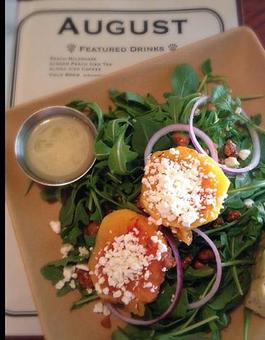 Product: Grilled Peach & Arugula Salad - Tomato Pie Cafe in Harrisburg, PA American Restaurants