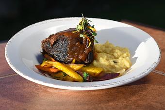 Product: Coffee & Port Braised Boneless Short Rib
Brown butter whipped white yams, heirloom carrots with shallots, parsley and a Port wine jus lie - Tonto Bar & Grill in Rancho Manana - Cave Creek, AZ American Restaurants